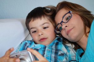 mother-and-son-looking-at-photos